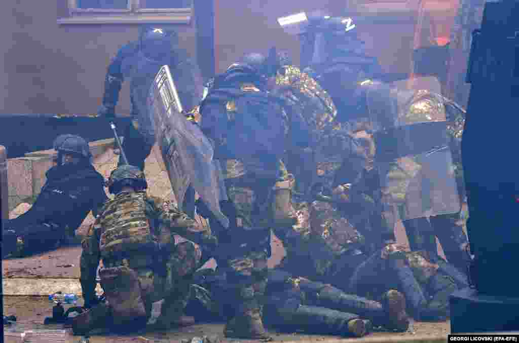 KFOR troops lie injured after a scuffle with ethnic Serbs. Zvecan, a town of some 16,500 people, is one of four municipalities in northern Kosovo where ethnic Albanian mayors took office following elections that local Serbs refuse to recognize. 
