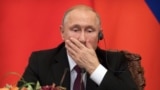 CHINA – Russian President Vladimir Putin attends a signing ceremony at the Great Hall of the People in Beijing, June 8, 2018