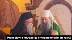 Mitropolit Joanikije i patrijah Porfirije (foto-arhiv)
