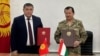 Камчыбек Ташиев и Саймумин Ятимов после подписания протокола по границе. 2 октября 2023 года. 