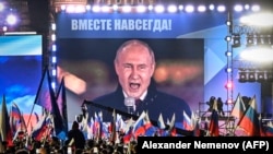 Президент России Владимир Путин выступает на митинге и концерте, посвященном аннексии четырех регионов Украины, оккупированных российскими войсками. Москва, 30 сентября 2022 года