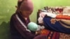 Надира Каримова с новорожденной дочерью.