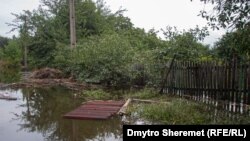 Затопило будинки та городи. Наслідки ракетних атак Росії по Кривому Рогу (фотогалерея)