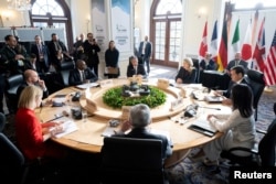 Canadian Foreign Minister Melanie Joly speaks during the G7 foreign ministers meeting in Quebec, Canada, on March 13. Rubio (second right) sits at the table with foreign ministers, including EU foreign policy chief Kaja Kallas (left).