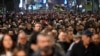 Opposition supporters take part in a march during a protest in Belgrade, on December 25, 2023, a week after the parliamentary and local elections in Serbia.