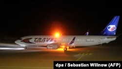 A Czech aircraft taxis before takeoff at Leipzig's airport on October 24, believed to be carrying the rejected asylum seekers, 11 of whom had criminal records.