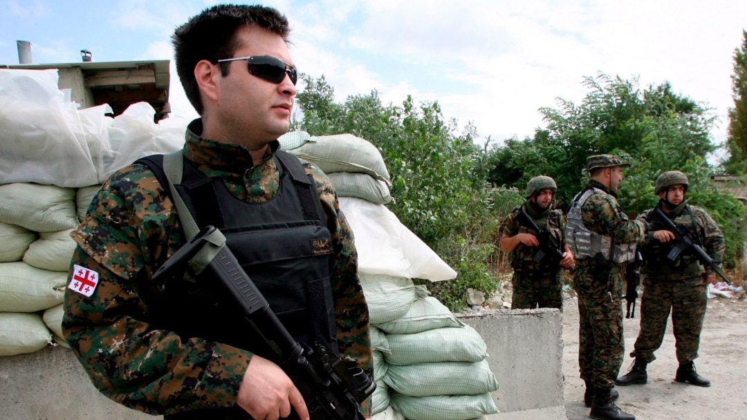 Georgian soldiers on the road near the village of Ergneti in South Ossetia on August 5