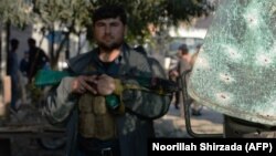 ارشیف، جلالاباد کې د یوې چاودنې سیمه کې راټول شوي پولیس
