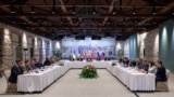 This handout photograph taken and released by Turkish Foreign Ministry on May 16, 2025, shows Turkish Foreign Minister, Hakan Fidan (C), Russian delegation (R) and Ukrainian delegation (L) attending a meeting for Ukraine-Russia peace talks at the Turkish 