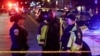 Ofițeri de poliție asigură perimetrul în locul în care doi angajați ai ambasadei Israelului au fost uciși într-un atac armat la Washington, SUA, 21 mai 2025.
