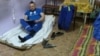 Водитель скорой помощи Павел Денисов в комнате отдыха
