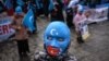 Протестувальники-уйгури, які втратили зв’язок зі своїми рідними на акції в Східному Туркестані (Китай), на акції протесту проти китайської політики, Стамбул, Туреччина, березень 2021 року