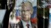 Портрет президента Росії Володимира Путіна у вікні магазину. Крим, Сімферополь, жовтень 2014 року 