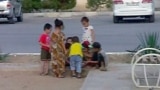 Turkmenistan. The kids play together on the playground. Ashgabat, 2021.