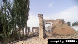 A burned school in the village of Shark near Osh