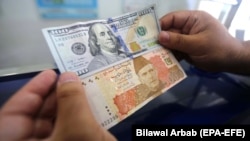 ارشیف: د ډالرو او پاکستانۍ روپۍ انځور