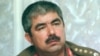 Owganystanyň prezidenti Hamid Karzaý (sagda) bilen general Abdul Reşit Dostum, 2002-njy ýylyň mart aýy.