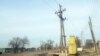 Illýustrasiýa suraty. Transformator we elektrik sütünleri