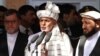 Afghan President Ashraf Ghani (C) speaking during the Eid al-Adha prayer ceremony at the presidential palace on September 1.