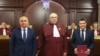 Președintele interimar Ilie Bolojan, președintele Curții Constituționale, Marian Enache, și președintele ales al României, Nicușor Dan, în timpul ceremoniei de validare a alegerilor de la CCR, 22 mai 2025.