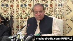 Ousted Prime Minister Nawaz Sharif addresses the press in Islamabad on September 26.