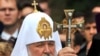 Ukraine -- Russian Orthodox Patriarch Kirill blesses believers during a service in Kyiv, 27Jul2009