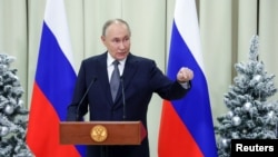 Владимир Путин, раиси ҷумҳури Русия.